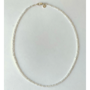eautiful, handcrafted 2mm round faceted Moonstone semi-precious stone necklace; elegant on its own or with a pendant/charm, and perfect for layering; adorned with .925 sterling silver Jai Style hand-embossed charm and lobster clasp; 16" necklace.
