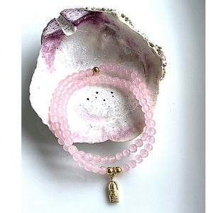 Beautiful polished 4mm Rose Quartz semi-precious stone bracelets. Adorned with gold vermeil ball beads. Also available with gold vermeil amulet hand-cast in .925 sterling silver and plated in 22K gold. Stretch bracelet measures 18.4 cm (7 1/4 in.).