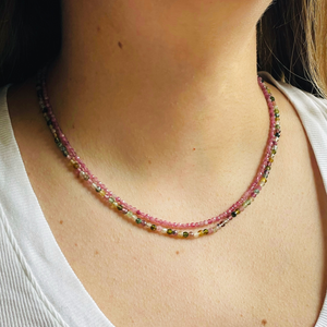 Beautiful, handcrafted 2mm round faceted Pink Amethyst semi-precious stone necklace; elegant on its own or with a pendant/charm, and perfect for layering; adorned with .925 sterling silver Jai Style hand-embossed charm and lobster clasp; necklace measures 16".