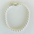 Jai Style simple, elegant, 7" handmade solid sterling silver 4mm rice pearl bracelet with Jai Style embossed charm.