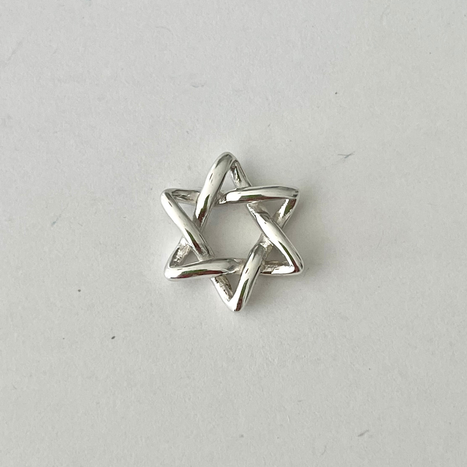 Perfect .925 solid sterling silver Star Charm. Charming on a necklace or bracelet; add it to a charm ring to customize your look; coordinate it with other charms to reflect your personal style and story.