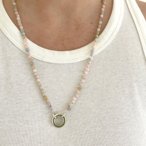 Beautiful, 4mm square cut faceted Beryl semi-precious stones are hand-knotted with silk thread and finished with a sterling silver Jai Style charm clasp; can be worn with clasp in the back or in the front with your favourite charm(s) or pendant; 24" length.