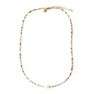 Beautiful, handcrafted 2mm Tourmaline semi-precious stone necklace features a single white organic freshwater potato pearl; elegant on its own and perfect for layering; adorned with 22K gold vermeil Jai Style hand-embossed charm, chain, and lobster clasp; available in two lengths: 16" necklace with 2" extender, and 18" necklace with 2" extender.
