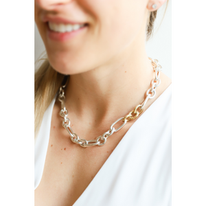 Jai Style handmade solid sterling silver oval-link chain with three 22K gold vermeil link accents for a beautiful mixed metal look. Adorned with Jai Style embossed sterling silver charm and lobster claw clasp. Necklace measures 45.7 cm (18 in.)